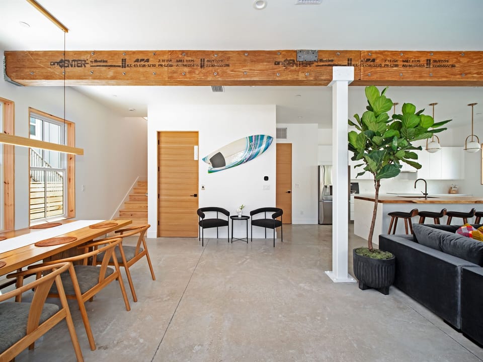 Step inside to an airy retreat where modern design meets coastal comfort