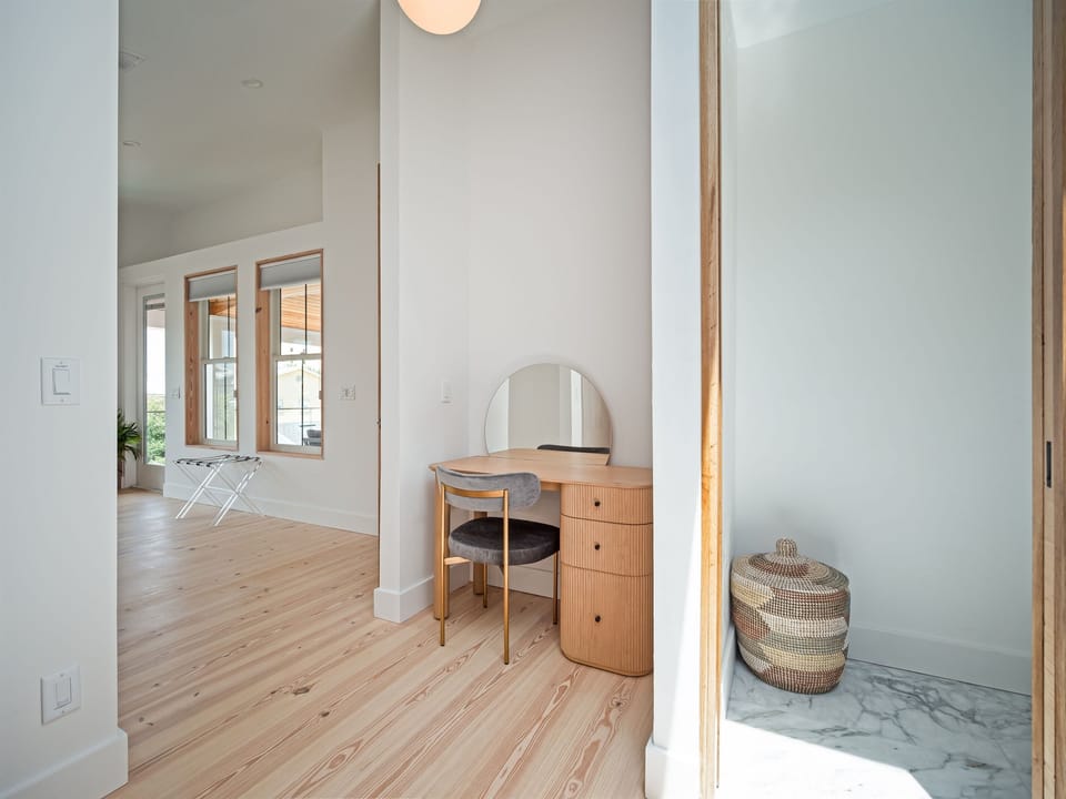 Primary suite featuring a private vanity nook, offering a quiet and thoughtfully designed space to get ready
