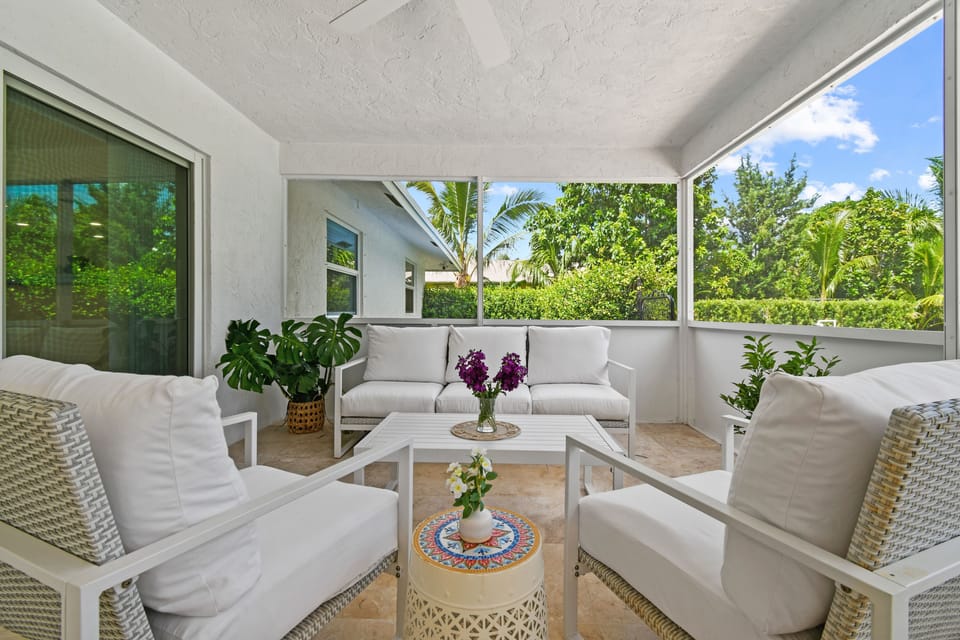 Outdoor sitting area under covered patio