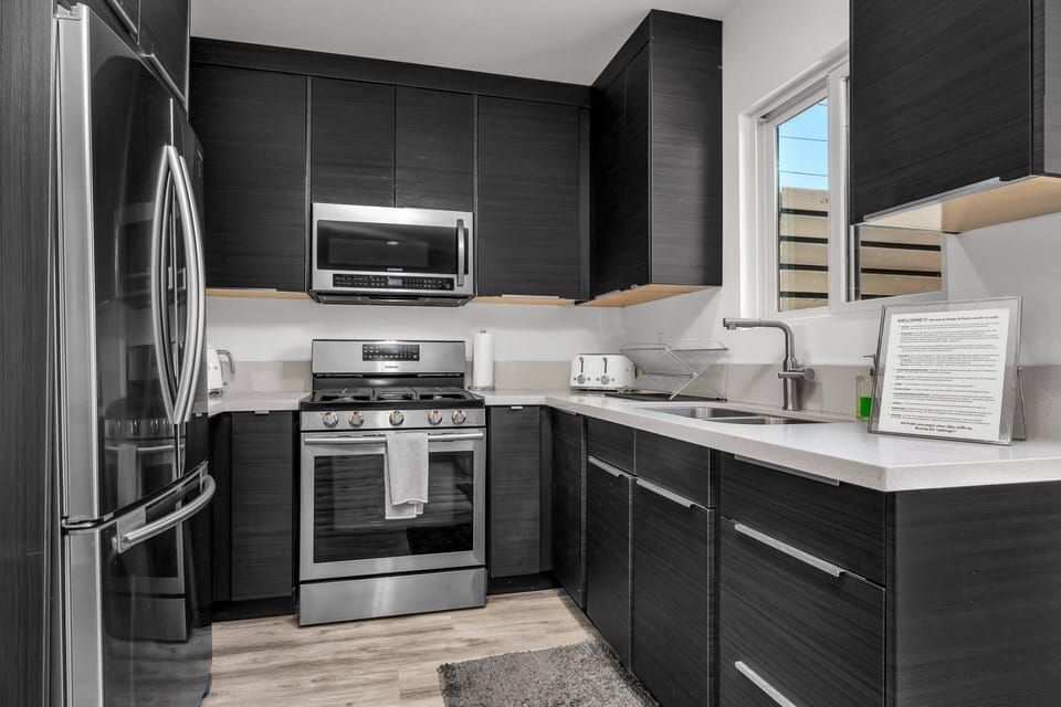 Stainless Steel Appliances in Kitchen Refrigerator, Stove/Oven and Microwave