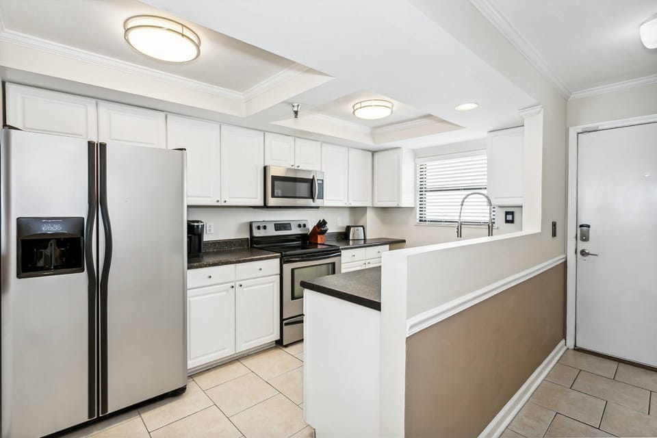 Notice the updated kitchen just as you walk in