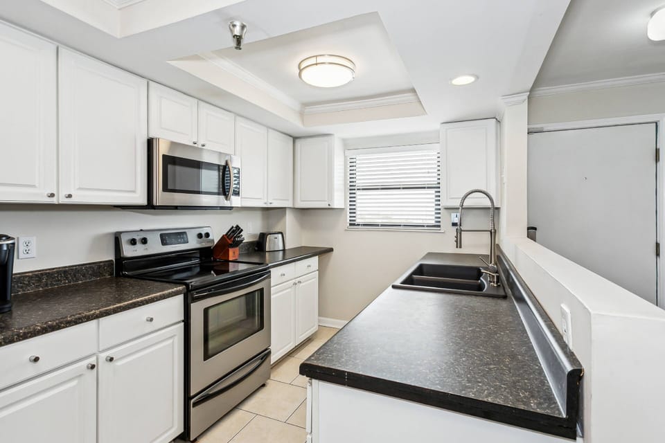 Fully equipped updated kitchen with stainless appliances