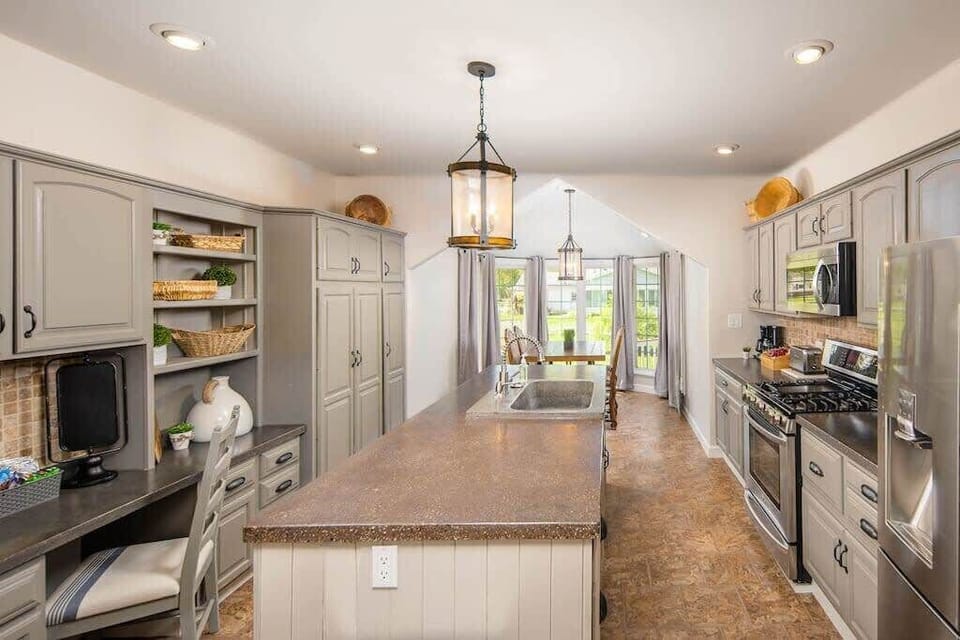 No expenses spared in our fully updated Kitchen with high end appliances and beautiful custom concrete sink and countertops.  Fully equipped for you to cook your home-cooked meals like you're in your own kitchen.