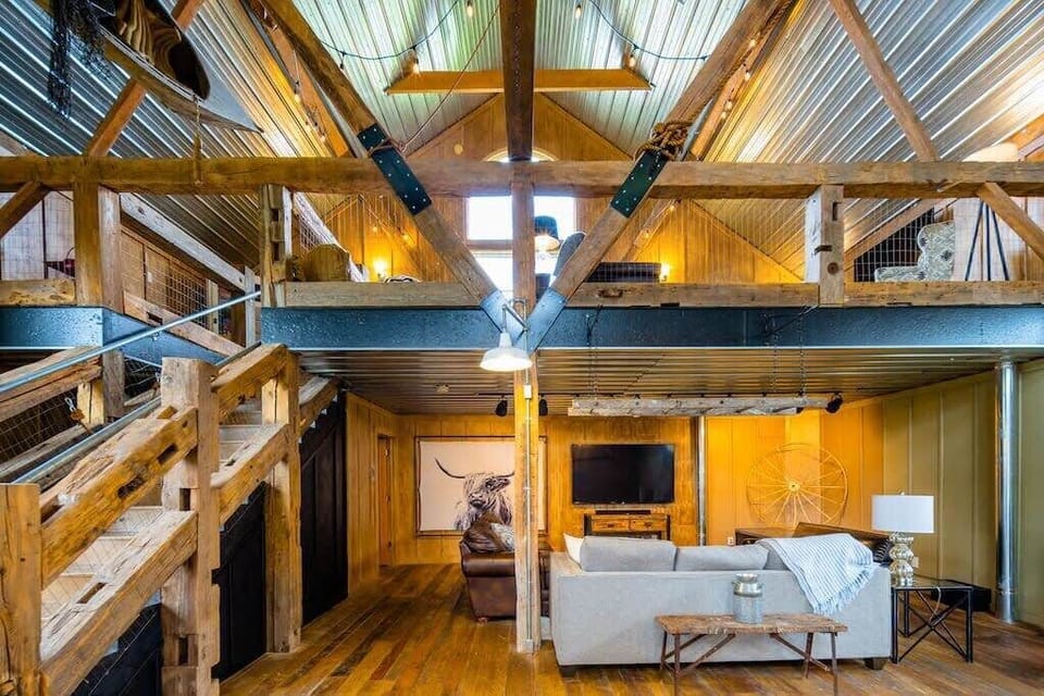 The Lower Lounge, complete with 75" smart TV and 3 comfortable couches.