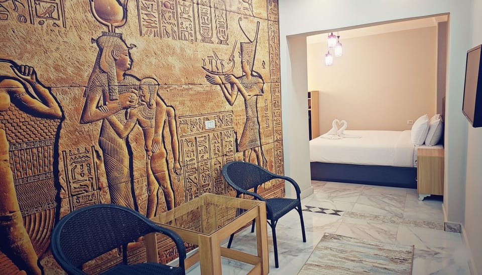 Deluxe Suite | Egyptian cotton sheets, premium bedding, down comforters