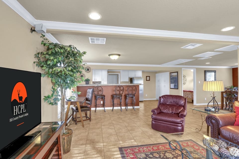 Behind the living room is the kitchen and work desk