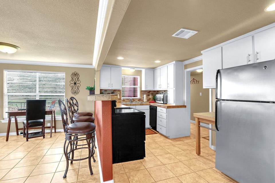 The kitchen is equipped with all appliances