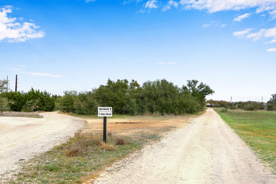 At the second sign, take the right towards the Red House