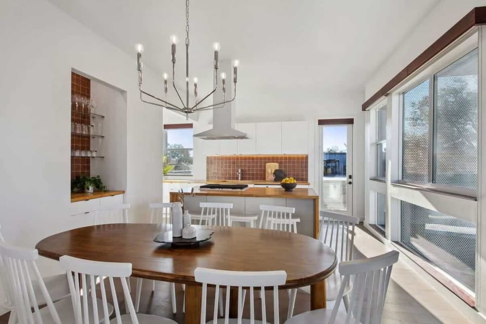 Dining Area | Dining Area with 10 Person Table and Chandelier | Second Floor