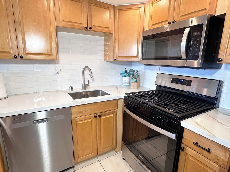 Our modern kitchen is a chefs dream, equipped with everything you need to whip up delicious meals.