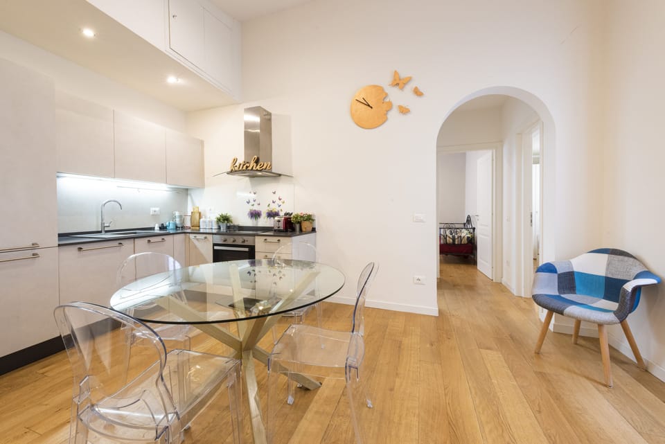 Design Apartment, City View | Living area | 40-inch flat-screen TV with digital channels