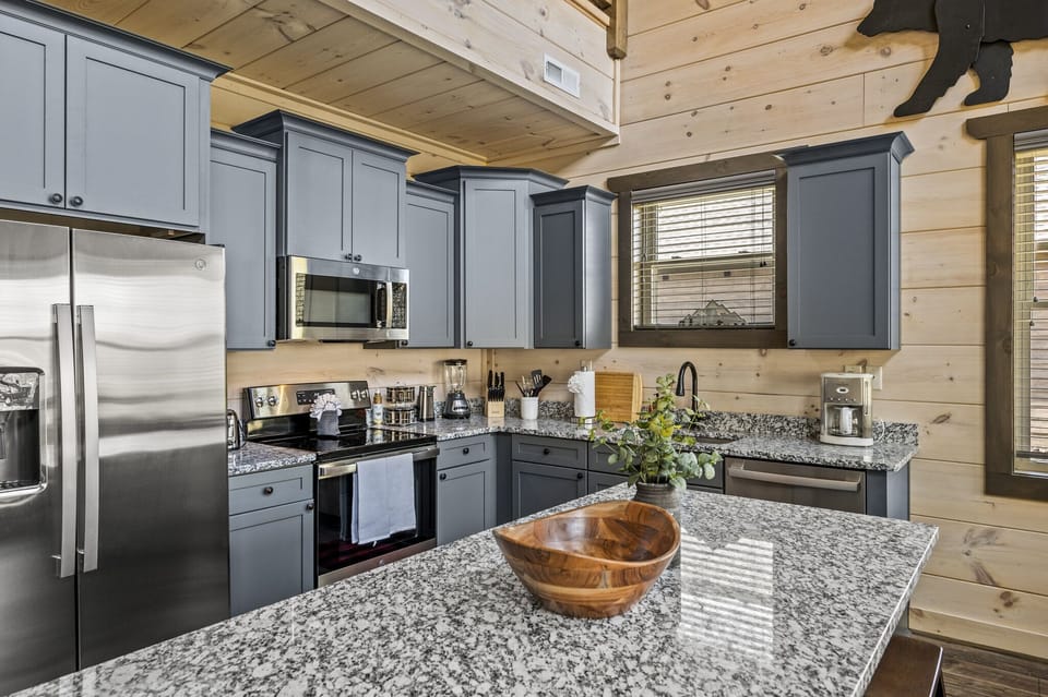 Cabin By The Creek's fully equipped kitchen