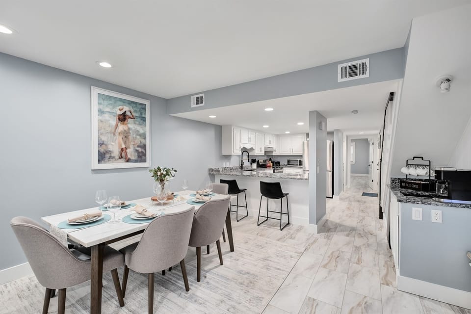 Enjoy family meals in the elegant dining area that seats 6 at the table and 2 at the bar. We also provide a high chair for the babies not pictured here.
