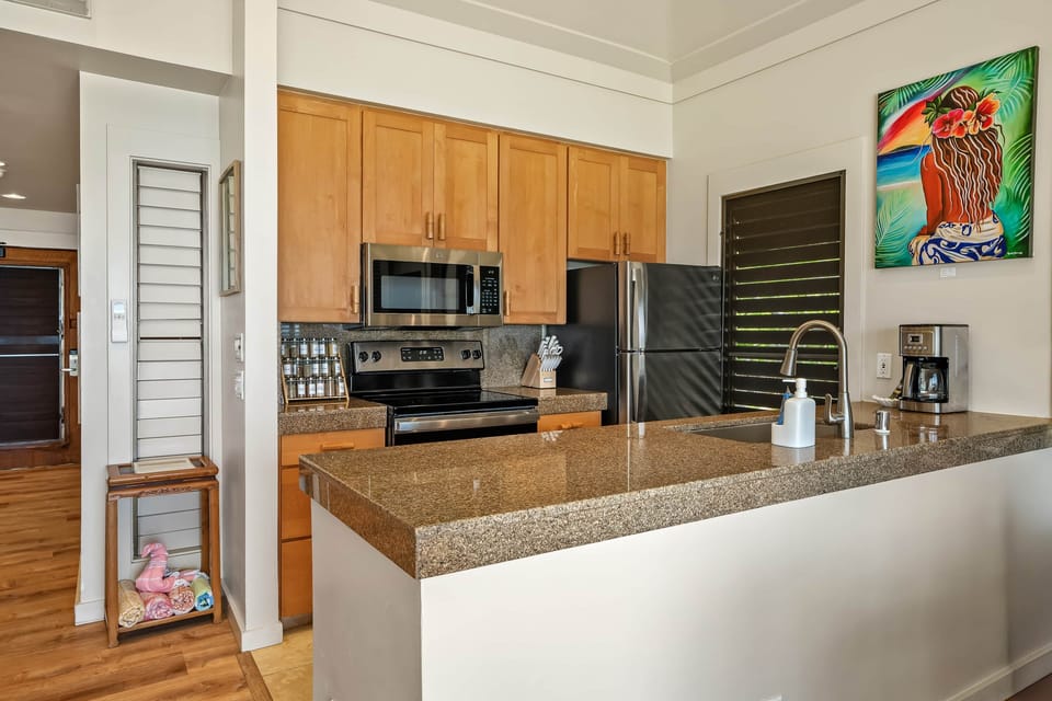 Step into this modern kitchen where style meets functionality.
