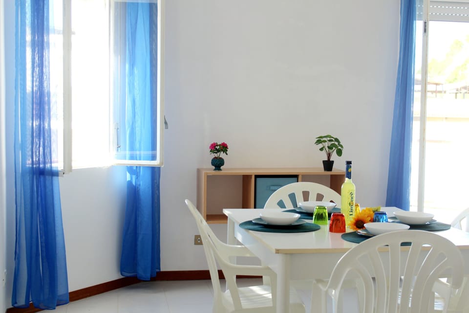 Apartment | Living area | 26-inch flat-screen TV with digital channels