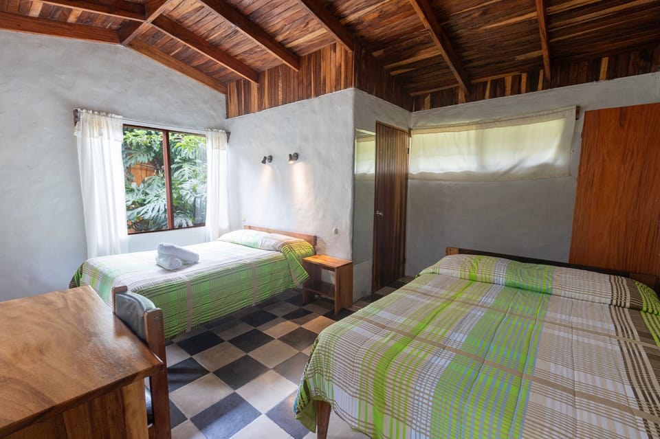 Twin Room, Garden View | In-room safe, individually decorated, desk, free WiFi