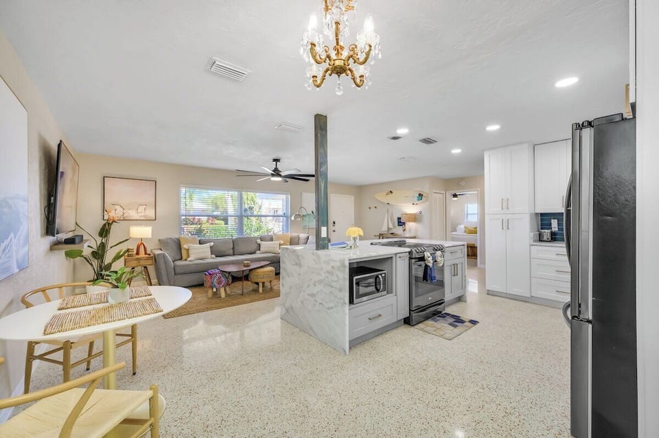 Open concept living room and kitchen area. 