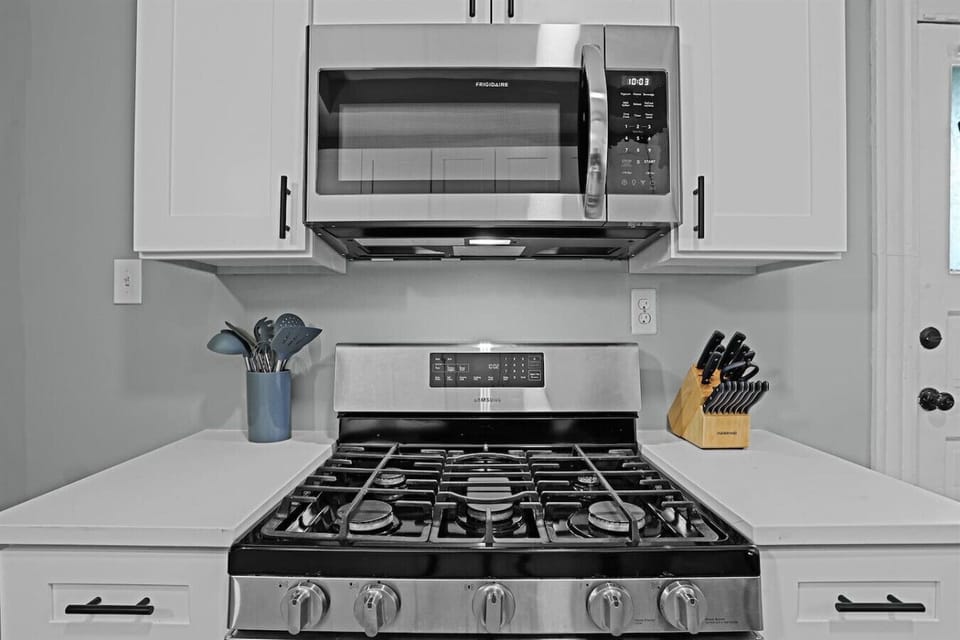 Sleek stainless steel appliances and ample prep space for culinary adventures.