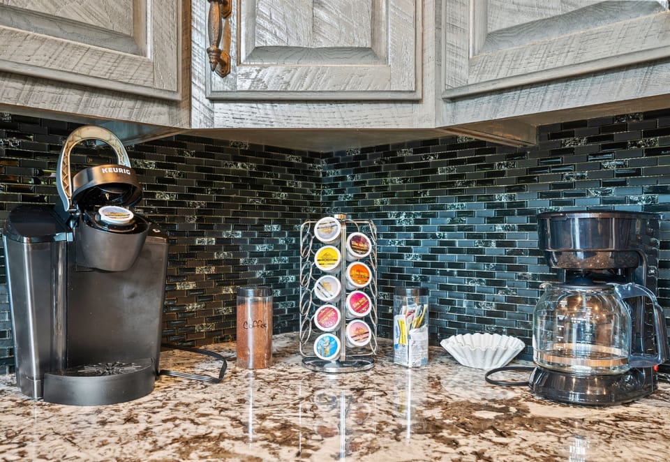 Caffeine lovers rejoice — your own coffee bar with Keurig, drip, and a full pod lineup to start the day strong.