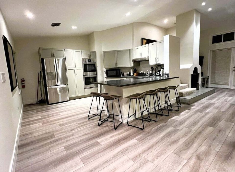 Experience our spacious, modern living area that's perfect for entertaining.