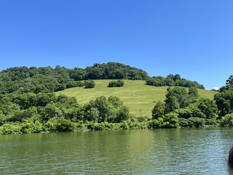 Rent a boat, canoe or paddleboard  for these countryside views from the lake.