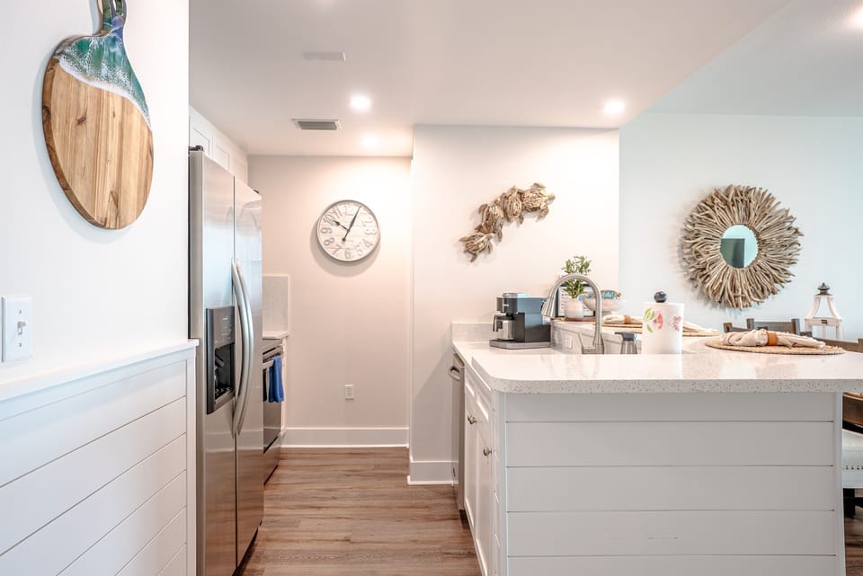 Compact, well‑organized kitchen with stainless appliances and everything you need for easy meal prep.