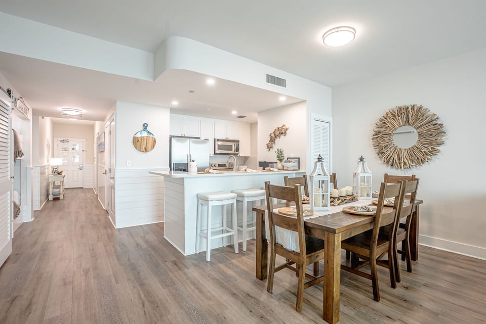 Another view of the kitchen showing the open layout and easy flow into the dining area.