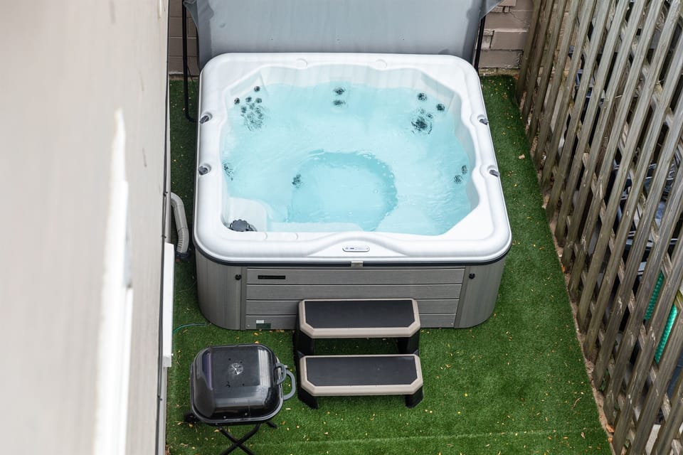 Sink Into Relaxation in the Inviting Hot Tub