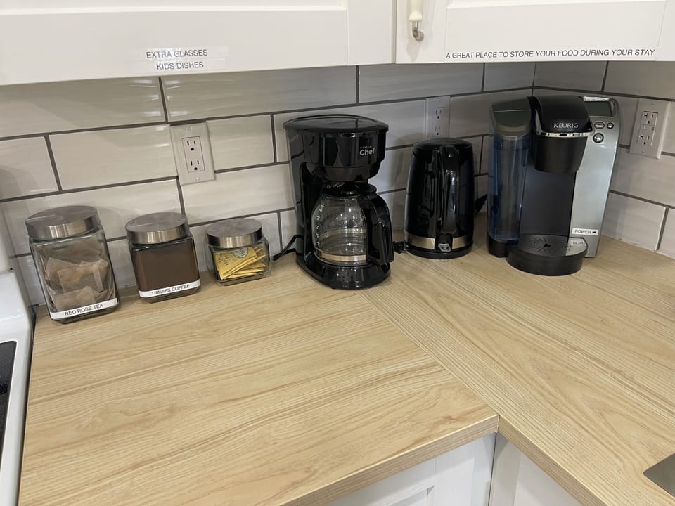 Keurig (pods NOT provided) percolator coffee, kettle, French press in the drawer