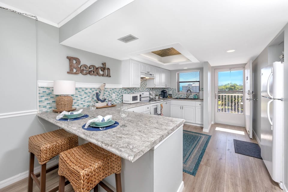 Bright, Open Kitchen with Updated Appliances Throughout