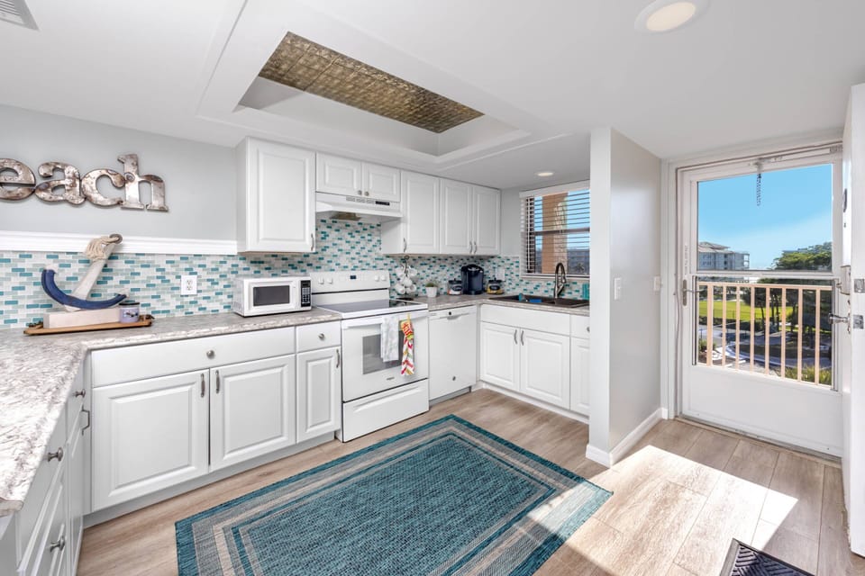 Bright, Open Kitchen with Updated Appliances Throughout