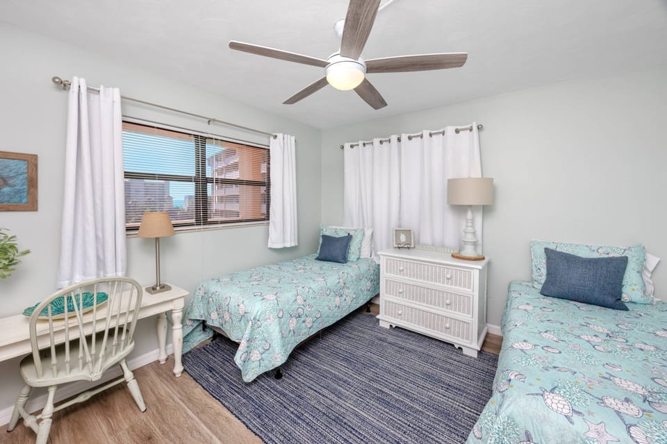 Guest Bedroom with Two Twin-Size Beds and Desk
