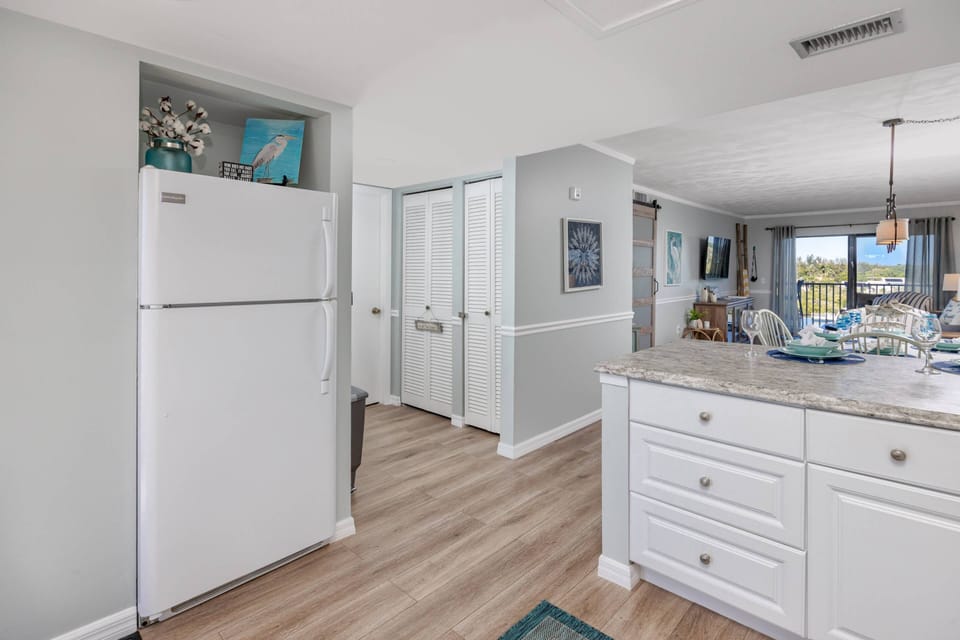 Kitchen Leads to the Dining and Living Room Areas