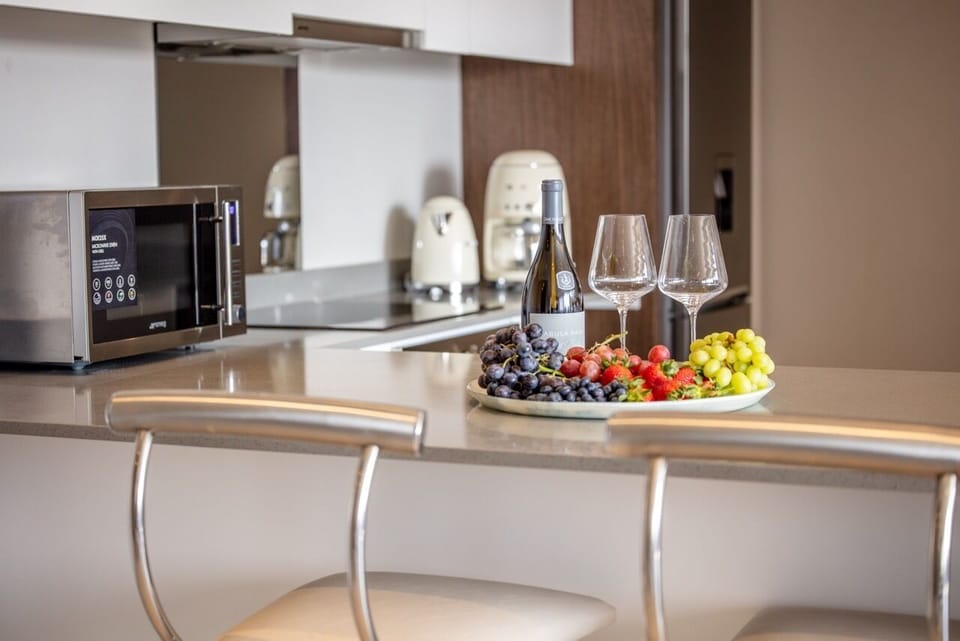 Luxury Apartment | Private kitchen | Full-size fridge, microwave, oven, dishwasher