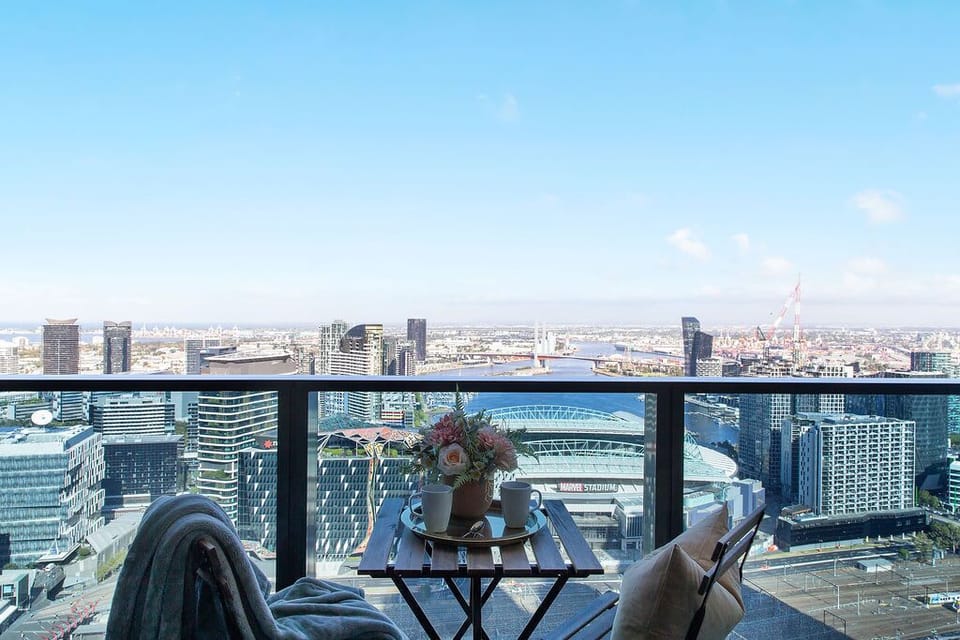 Enjoy the view of Docklands harbour from the balcony.