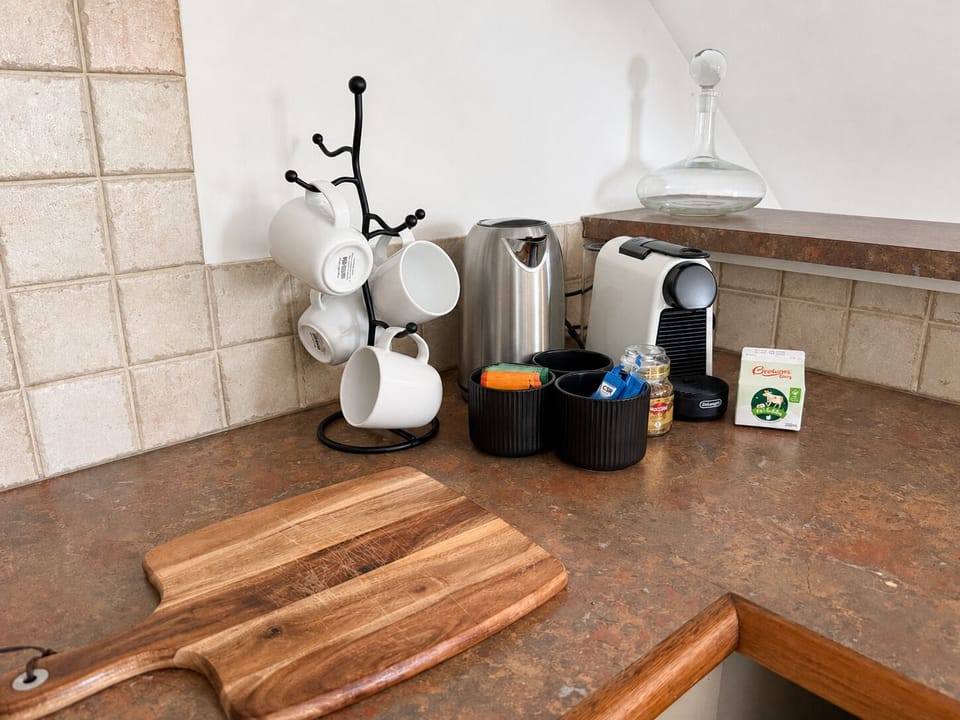 Coffee station with Nespresso : starter supply of Coffee pods, selection teas, sugar and fresh milk
