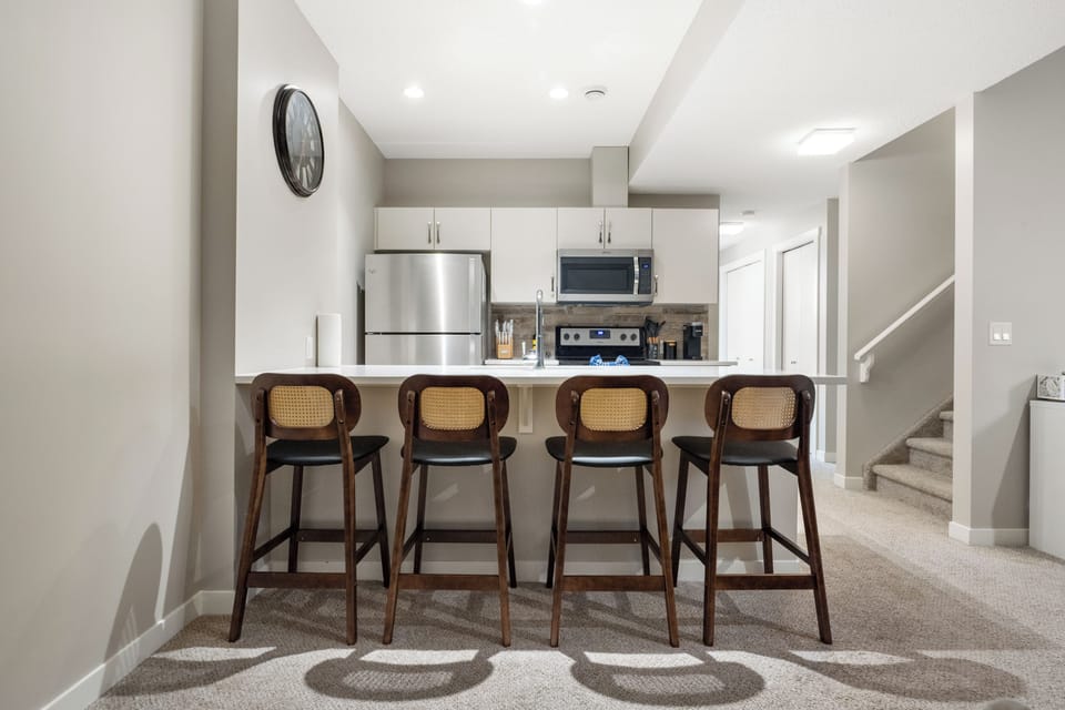 Bright, open kitchen and dining space designed for easy gatherings.