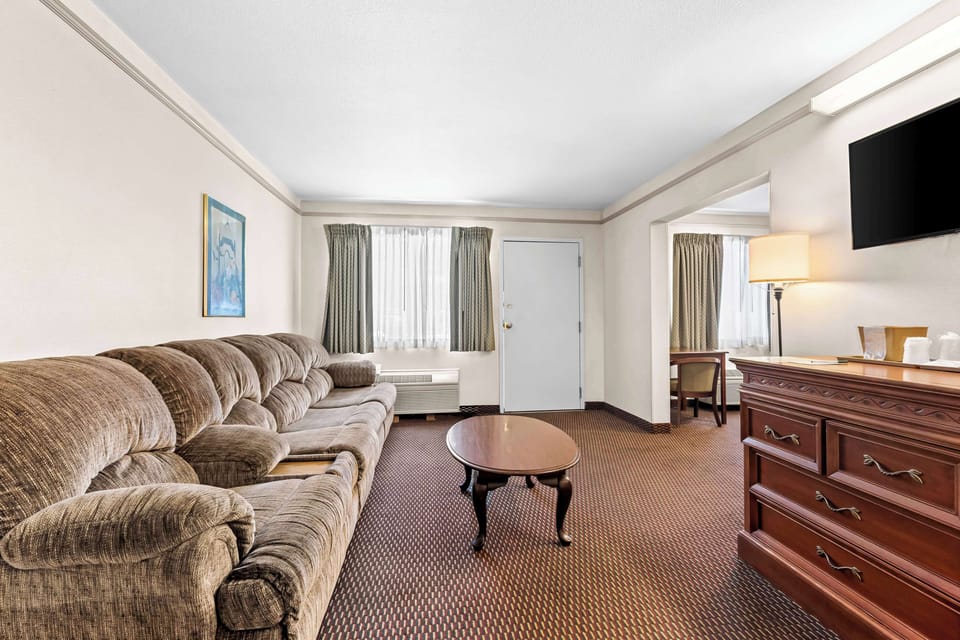 Suite, Multiple Beds, Non Smoking, Refrigerator & Microwave (with Sofabed) | Desk, laptop workspace, blackout drapes, iron/ironing board