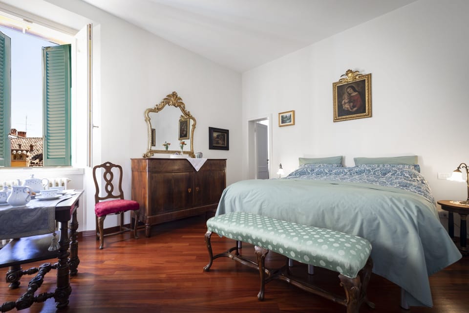 Suite Iride | 1 bedroom, down comforters, minibar, iron/ironing board