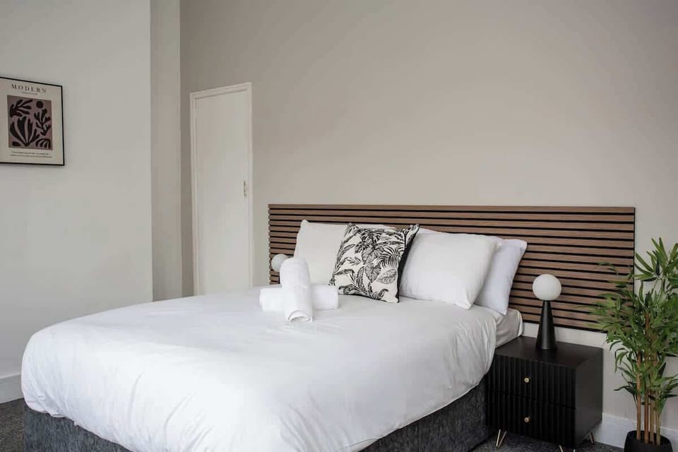 Slip into serenity in this luxurious main bedroom retreat