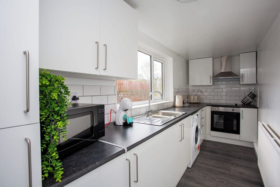 Revel in the convenience of a fully equipped kitchen with all modern facilities, including state-of-the-art appliances, ample counter space, and a variety of cooking utensils. 