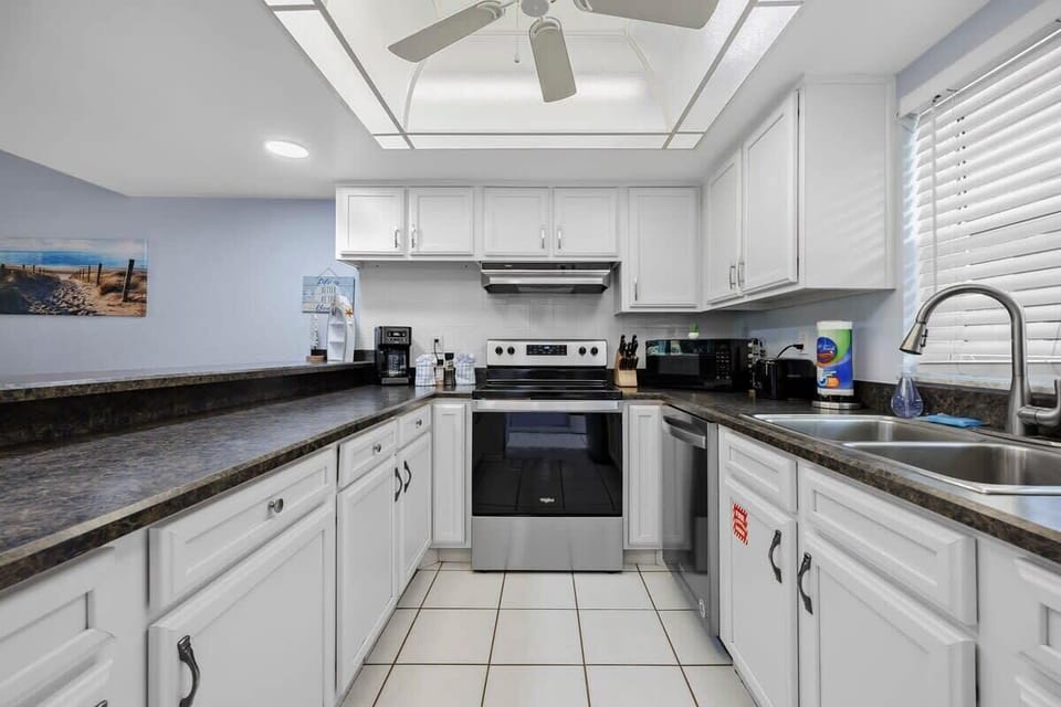 Modern kitchen with stainless steel appliances and ample counter space