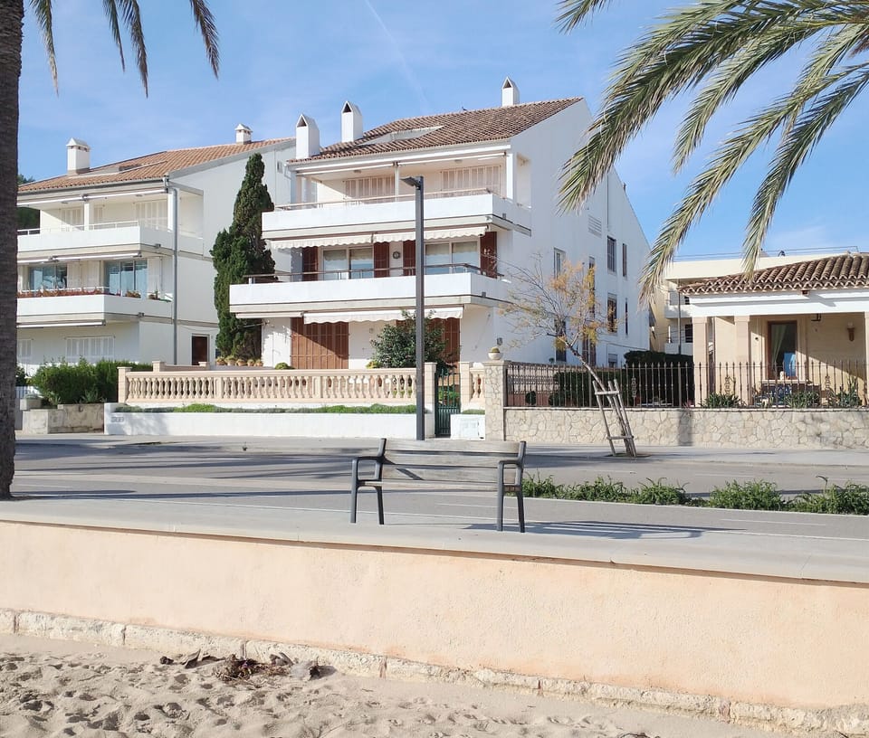 block as seen from beach, apartment at the rear