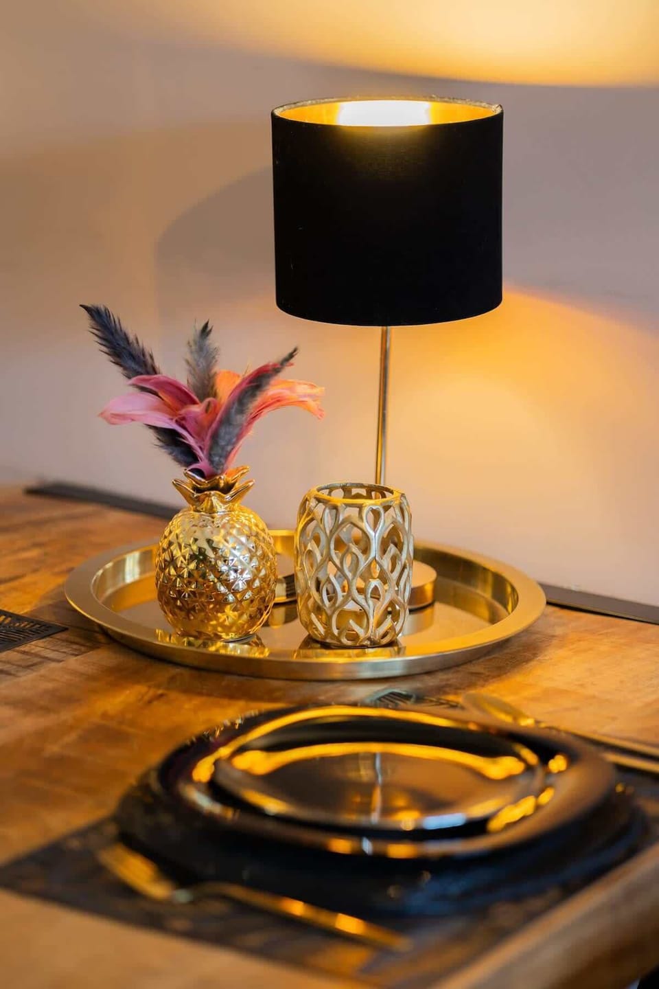 A close-up of a crystal lamp on a wooden table, creating a warm and inviting ambiance with subtle lighting.