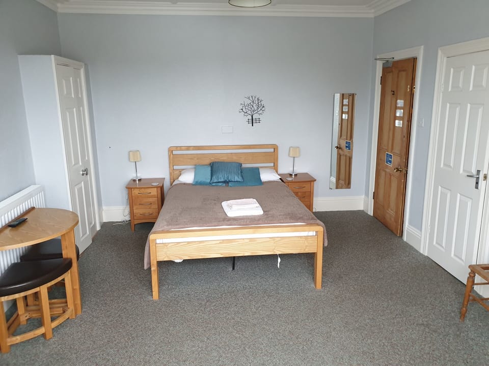 Desk, free WiFi, bed sheets