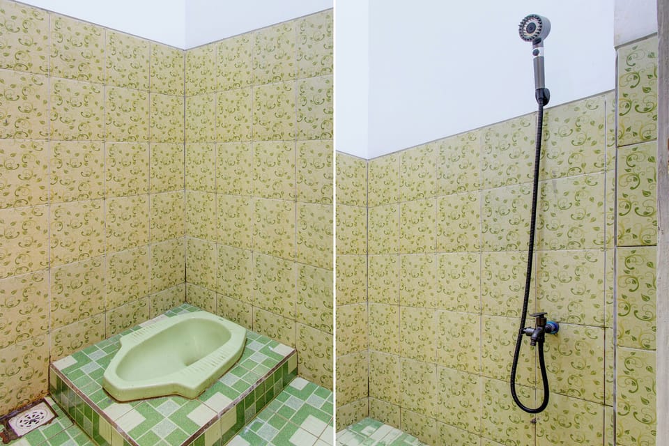 Standard Single Room | Bathroom | Shower, bidet, towels