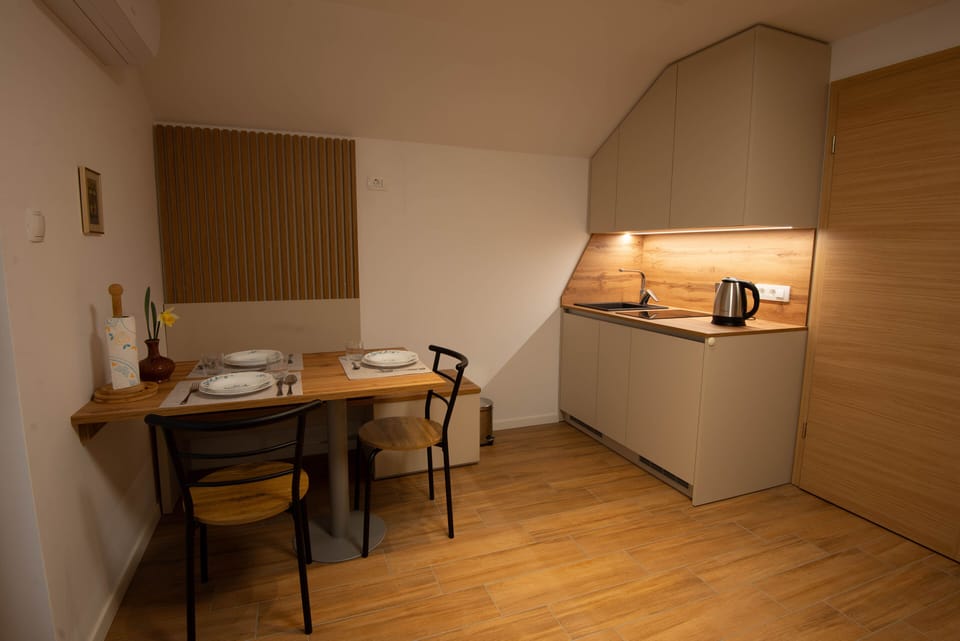 Mini-fridge, microwave, stovetop, coffee/tea maker