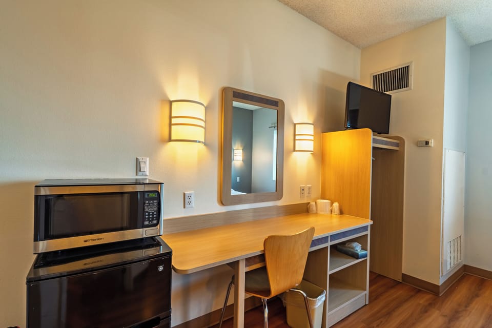 Desk, laptop workspace, WiFi (free), bed sheets