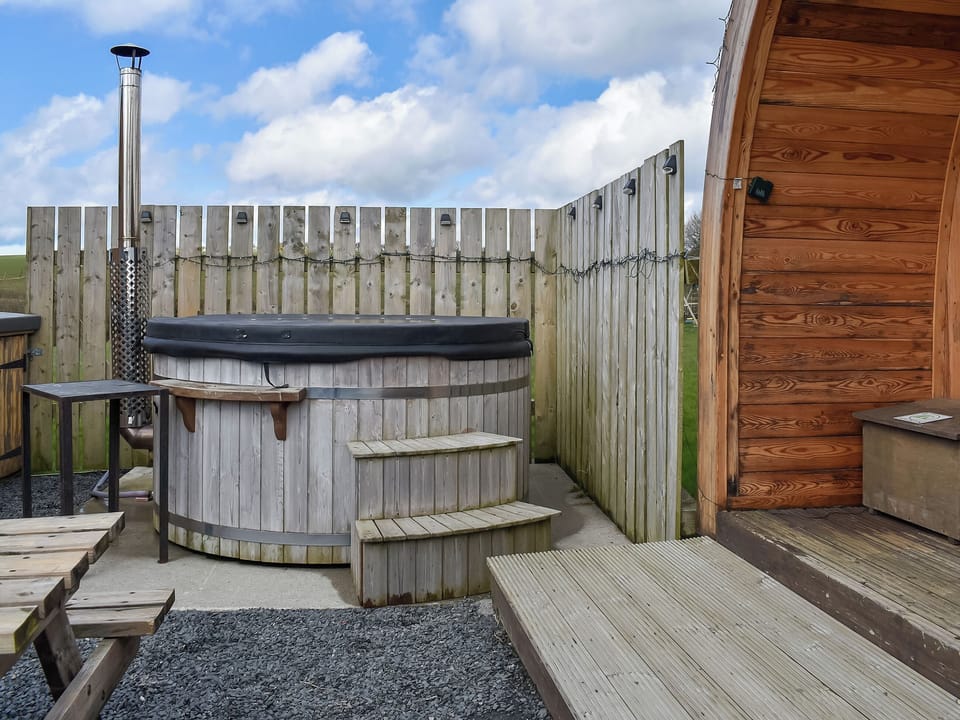 Decked terrace with outdoor furniture | Withy Bottom - Moorside Glamping Pods, Corney, near Millom