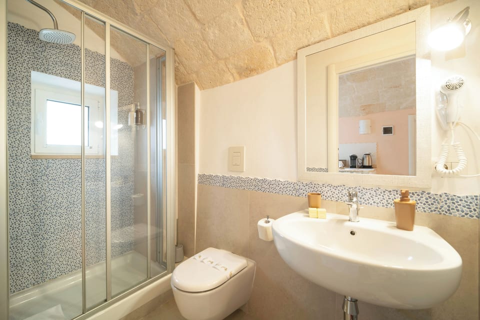 Standard Double Room, City View | Bathroom | Shower, hair dryer, slippers, towels